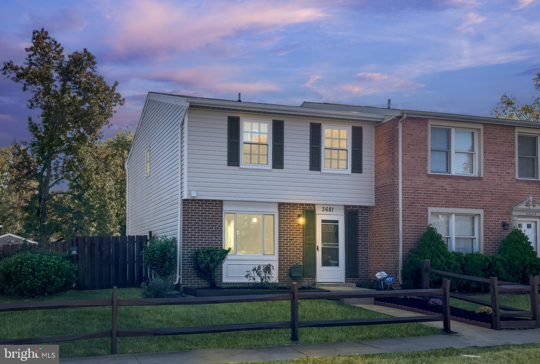 3681 Masthead Trail Triangle, VA 22172 - Photo 2 of 40 a front view of a house with garden