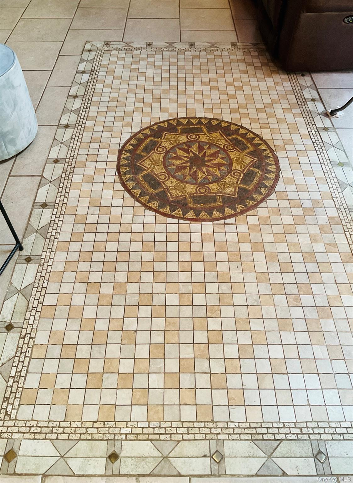 16 Gregory Road Monticello, NY 12701 - Photo 27 of 42 ornamental tile in livingroom