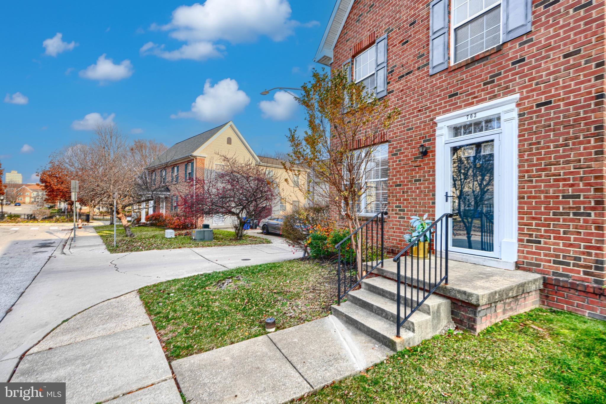 Charming brick facade with inviting entrance.