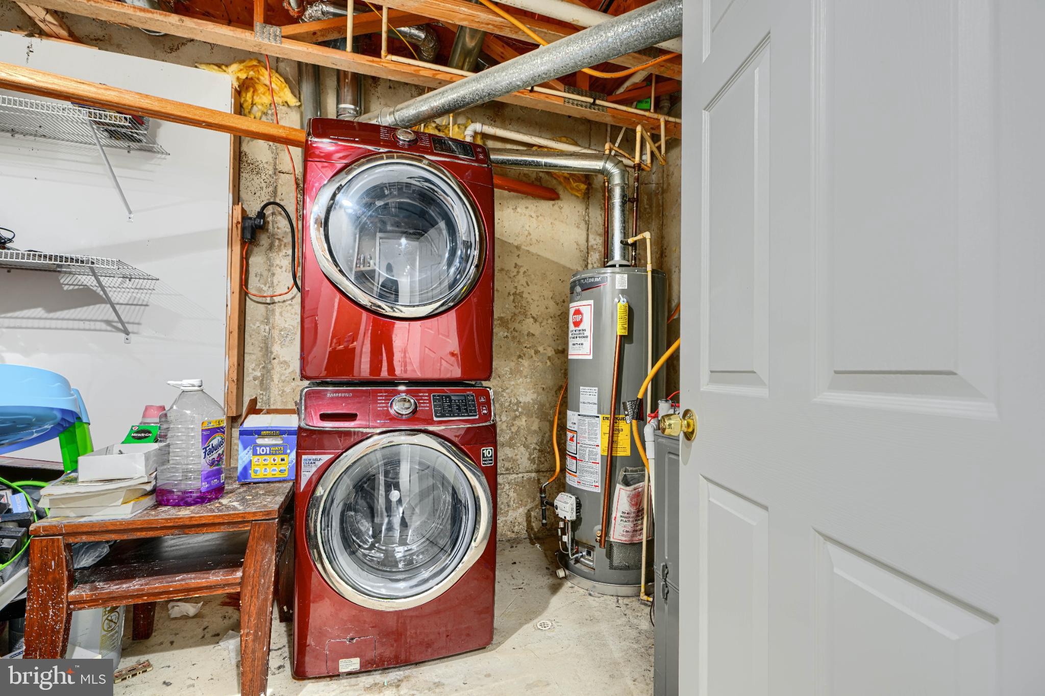 703 George Street Baltimore, MD 21201 - Photo 25 of 27 Modern laundry setup in a cozy basement.