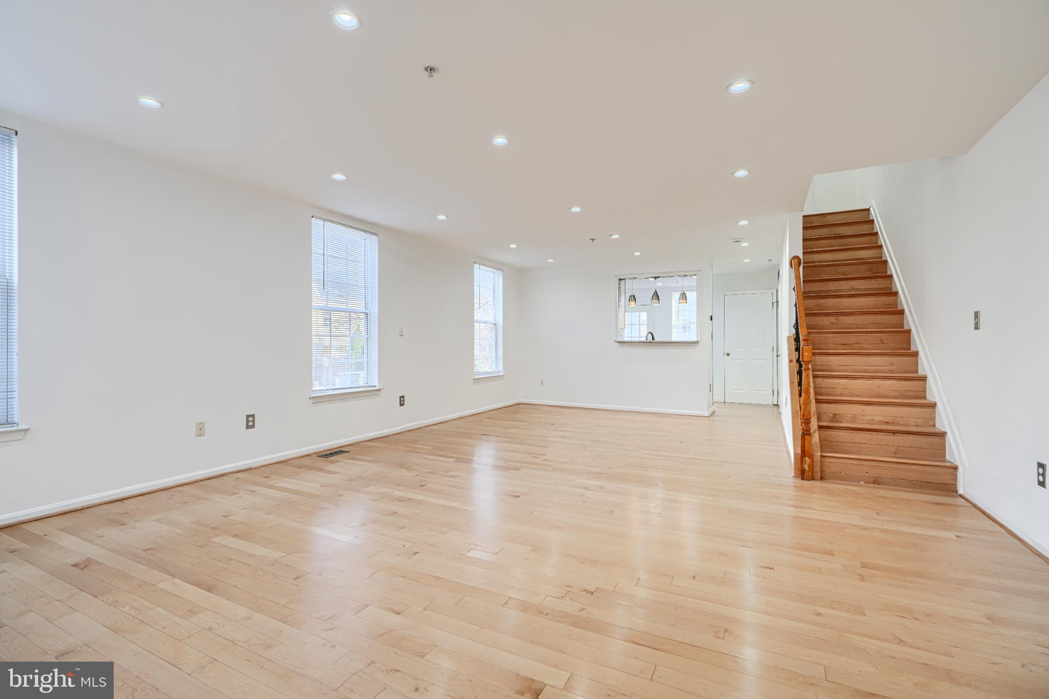703 George Street Baltimore, MD 21201 - Photo 3 of 27 Spacious, sunlit living area with elegance.