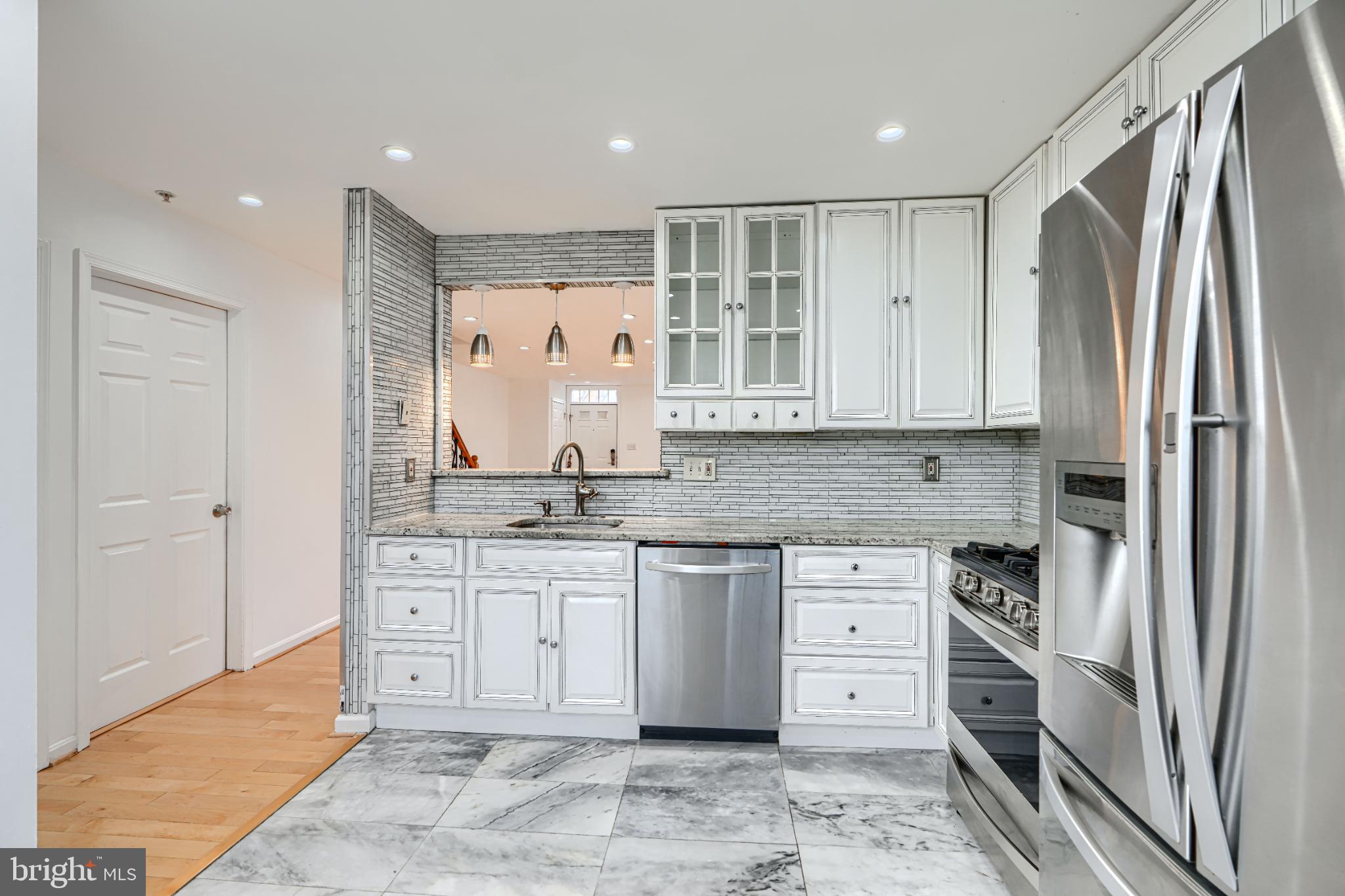 703 George Street Baltimore, MD 21201 - Photo 7 of 27 Modern kitchen with sleek finishes.