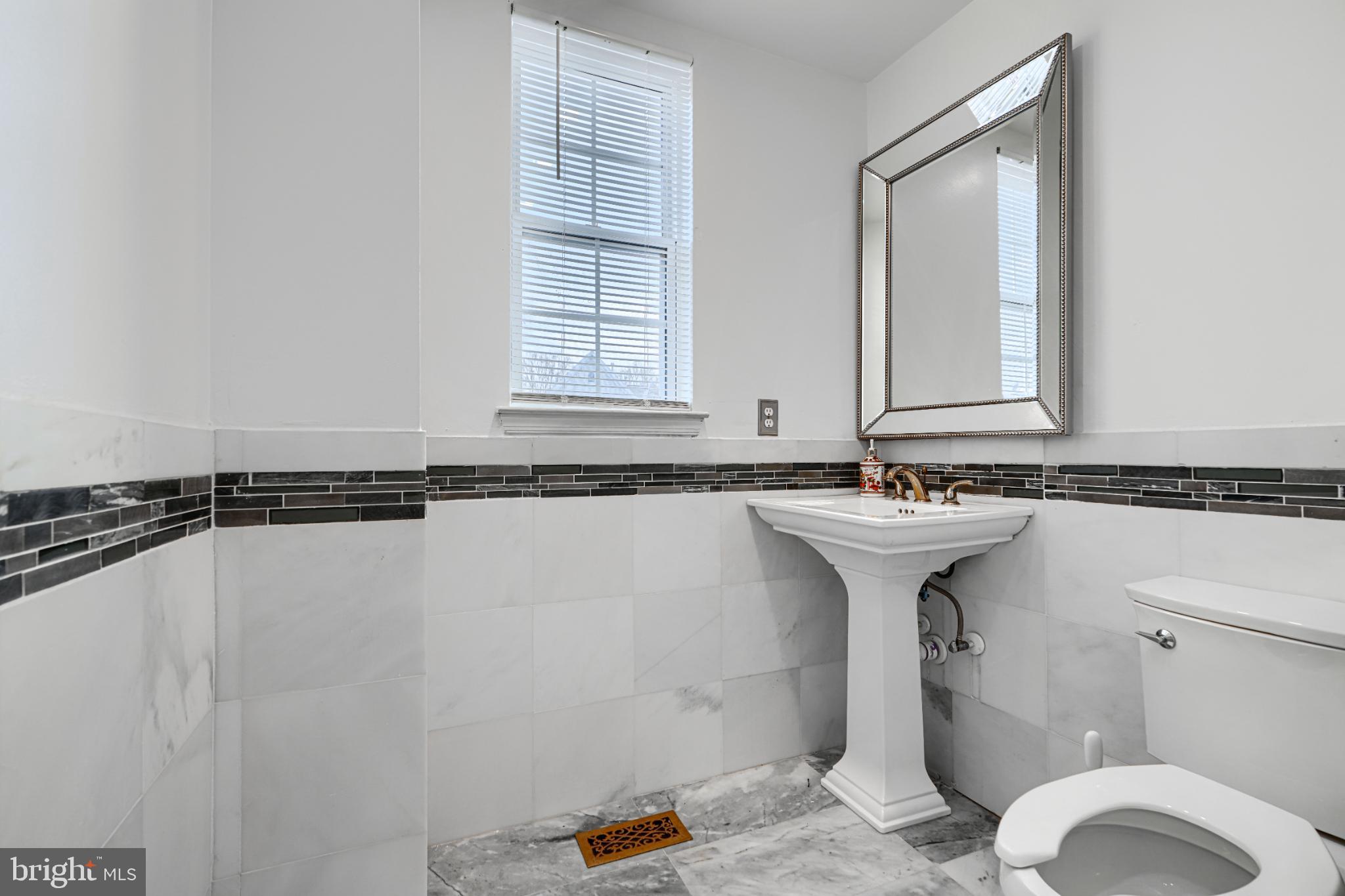 703 George Street Baltimore, MD 21201 - Photo 8 of 27 Elegant bathroom with modern finishes.