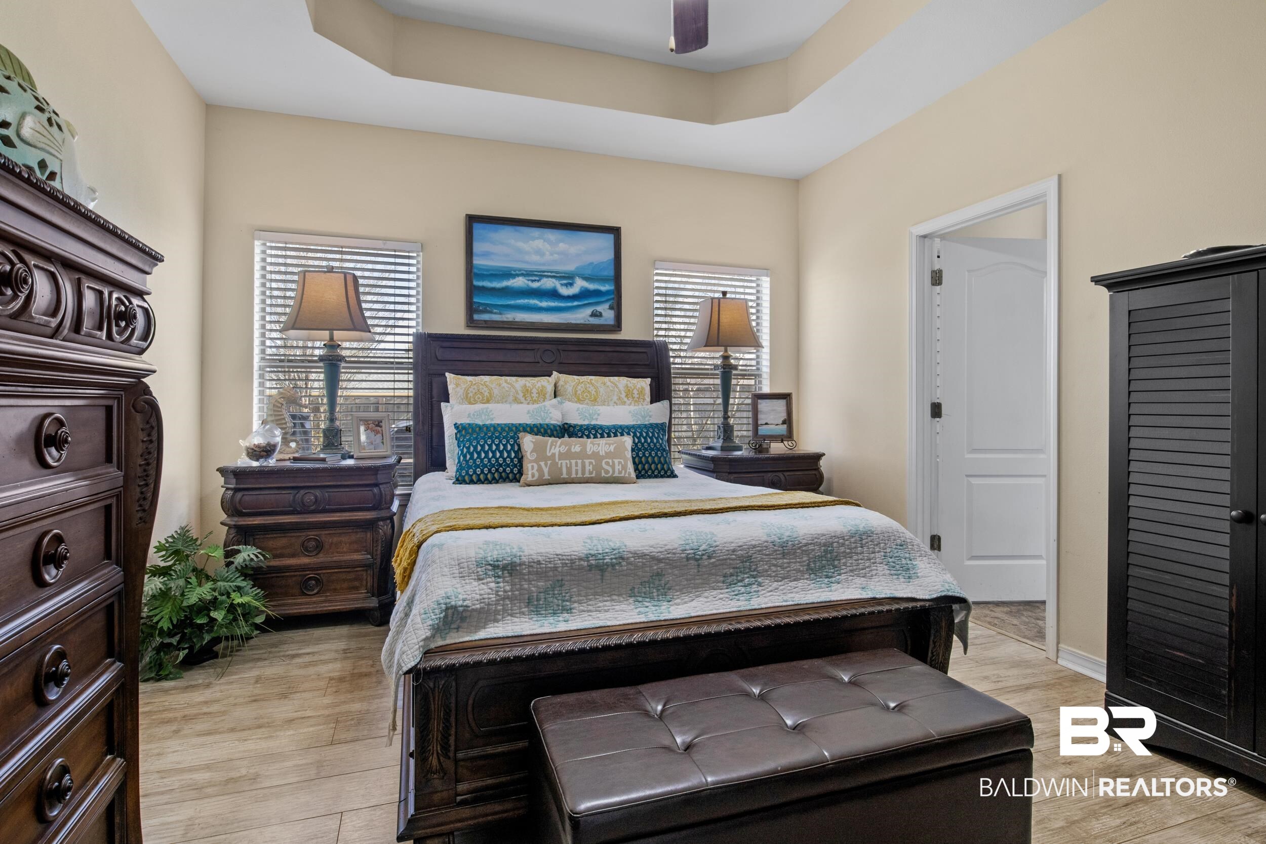 1752 Abbey Loop Foley, AL 36535 - Photo 9 of 21 Bedroom with a raised ceiling, light hardwood / wood-style flooring, and ceiling fan