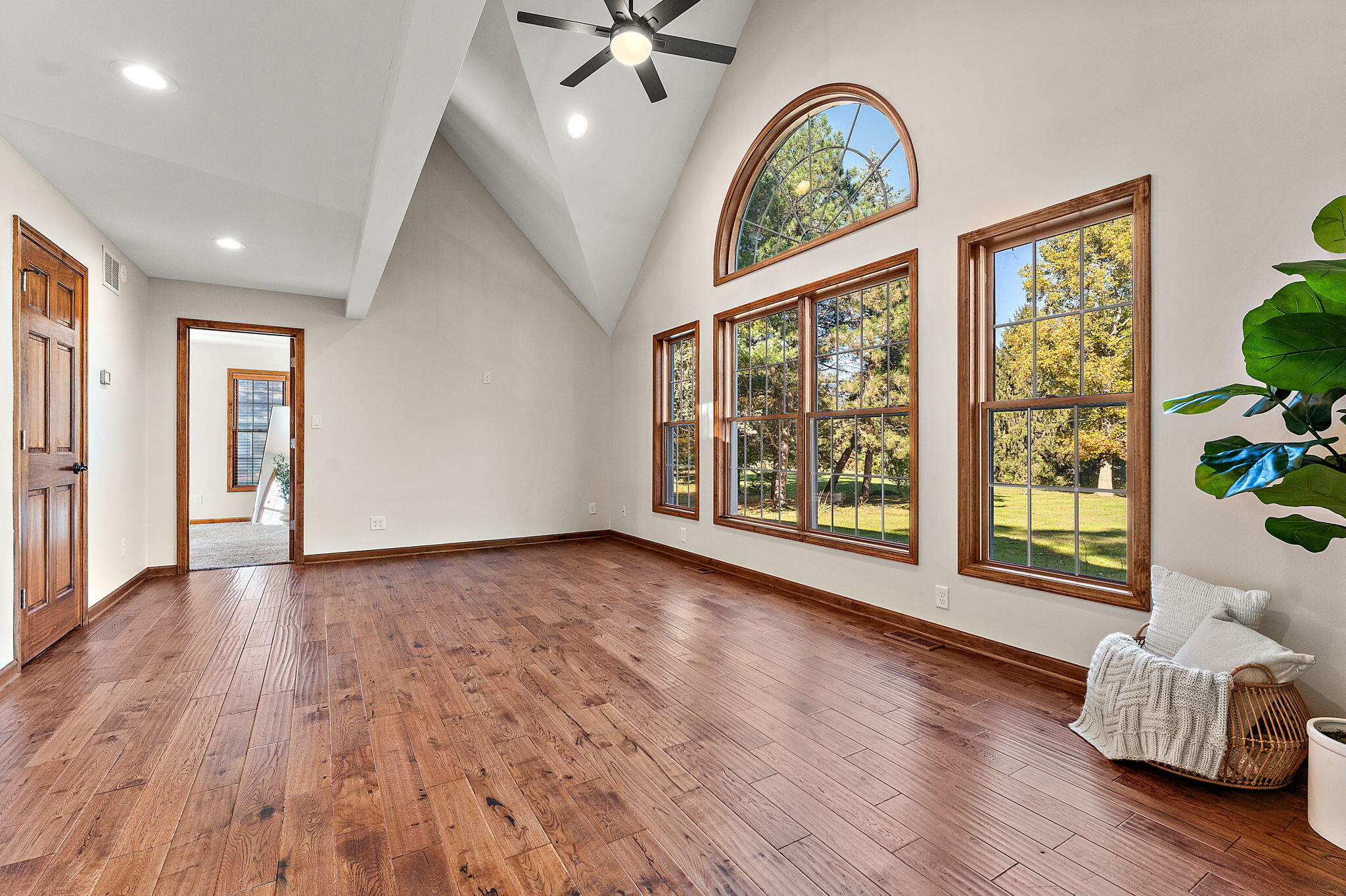 375 Reif Drive Hebron, IN 46341 - Photo 11 of 58 a view of an empty room with a window and wooden floor