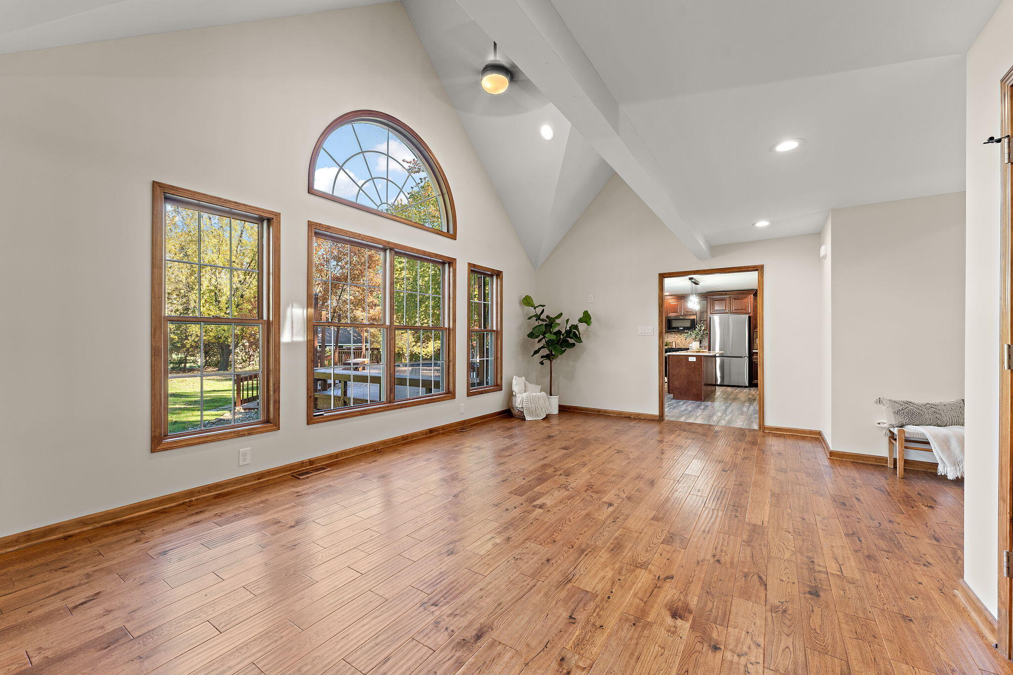375 Reif Drive Hebron, IN 46341 - Photo 14 of 58 a view of an empty room with a window and wooden floor