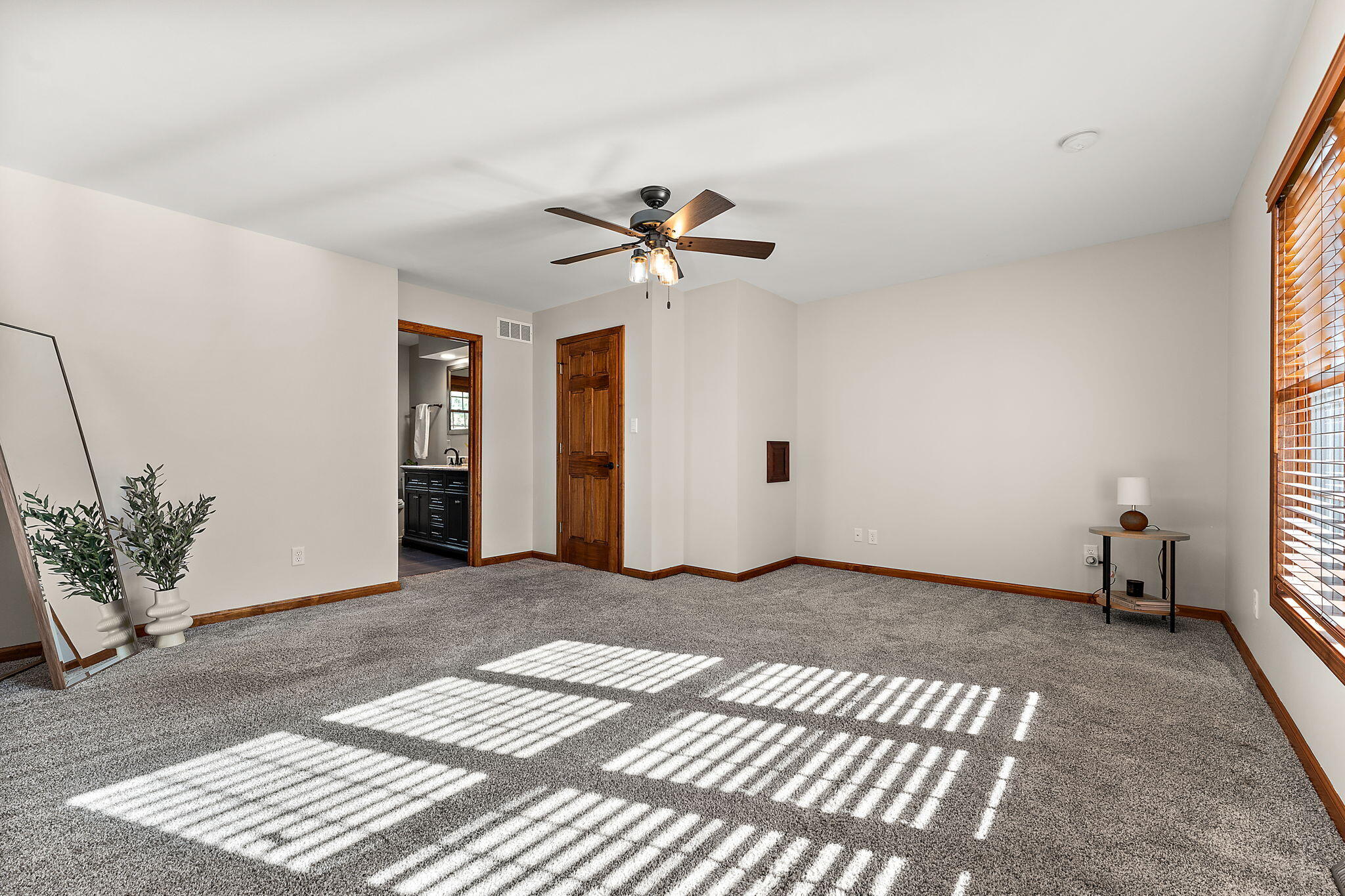 375 Reif Drive Hebron, IN 46341 - Photo 26 of 58 a view of a livingroom with a chandelier fan and wooden floor