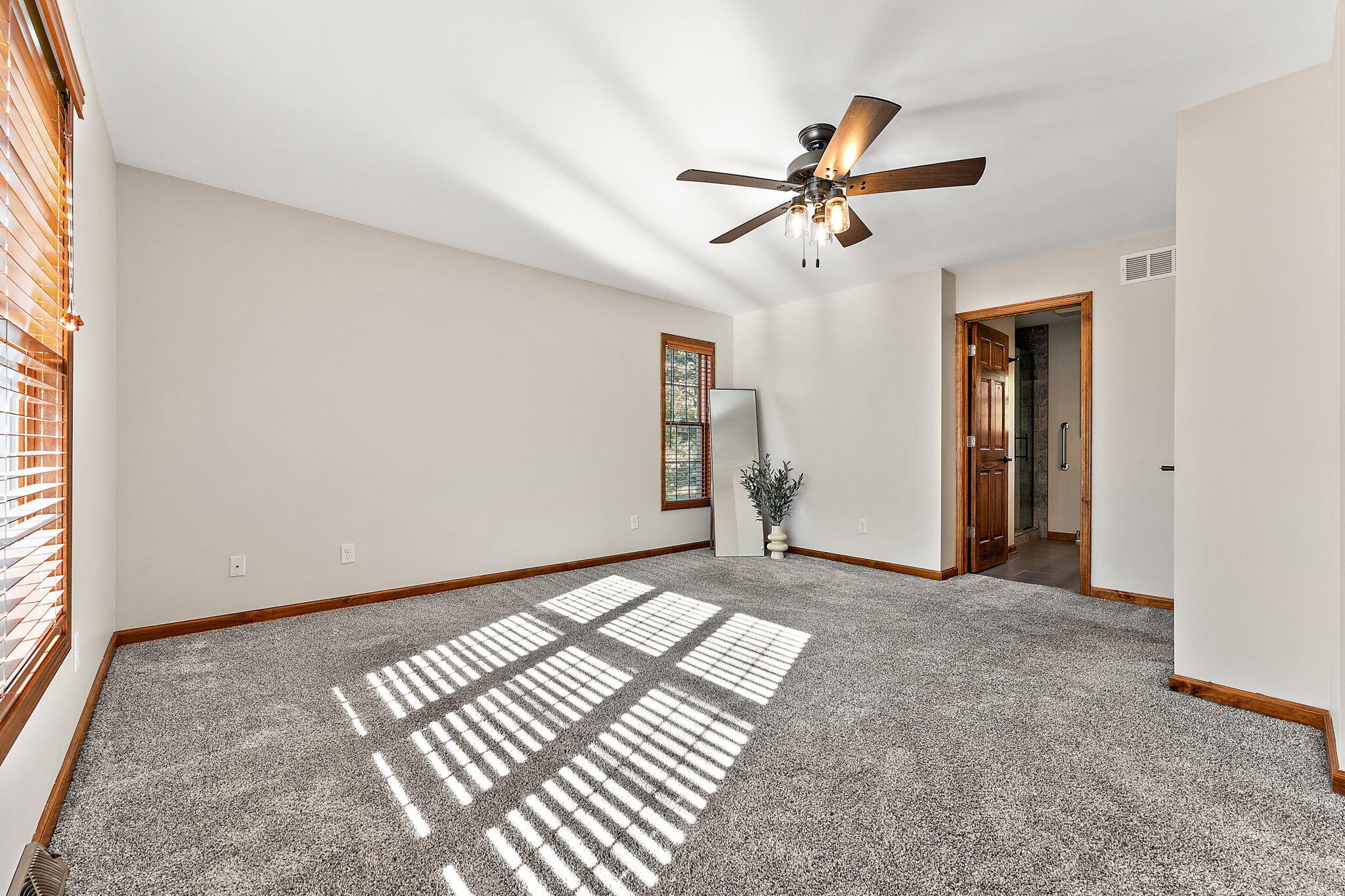 375 Reif Drive Hebron, IN 46341 - Photo 27 of 58 a view of empty room with wooden floor and fan