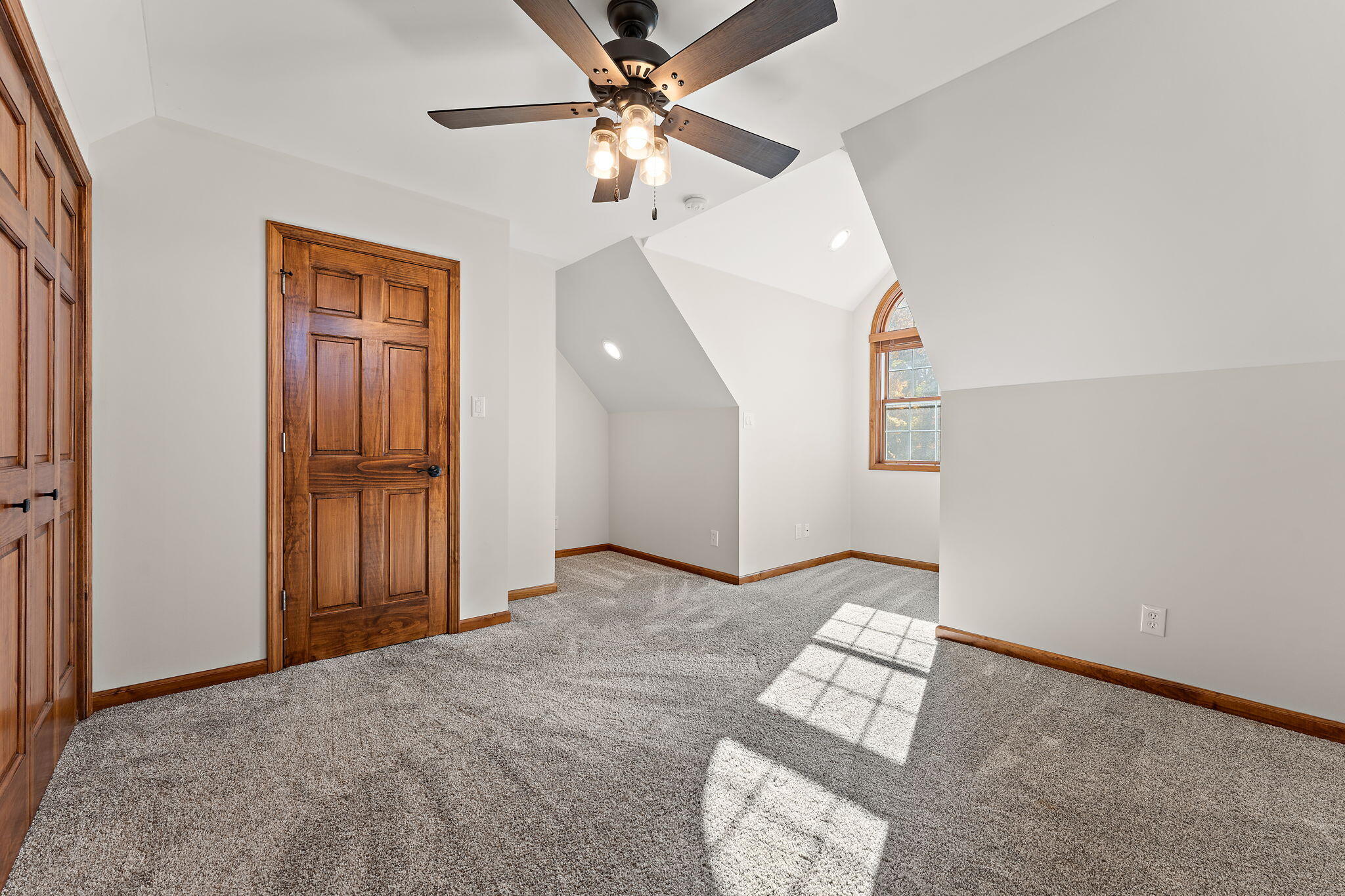 375 Reif Drive Hebron, IN 46341 - Photo 35 of 58 an empty room with windows and ceiling fan