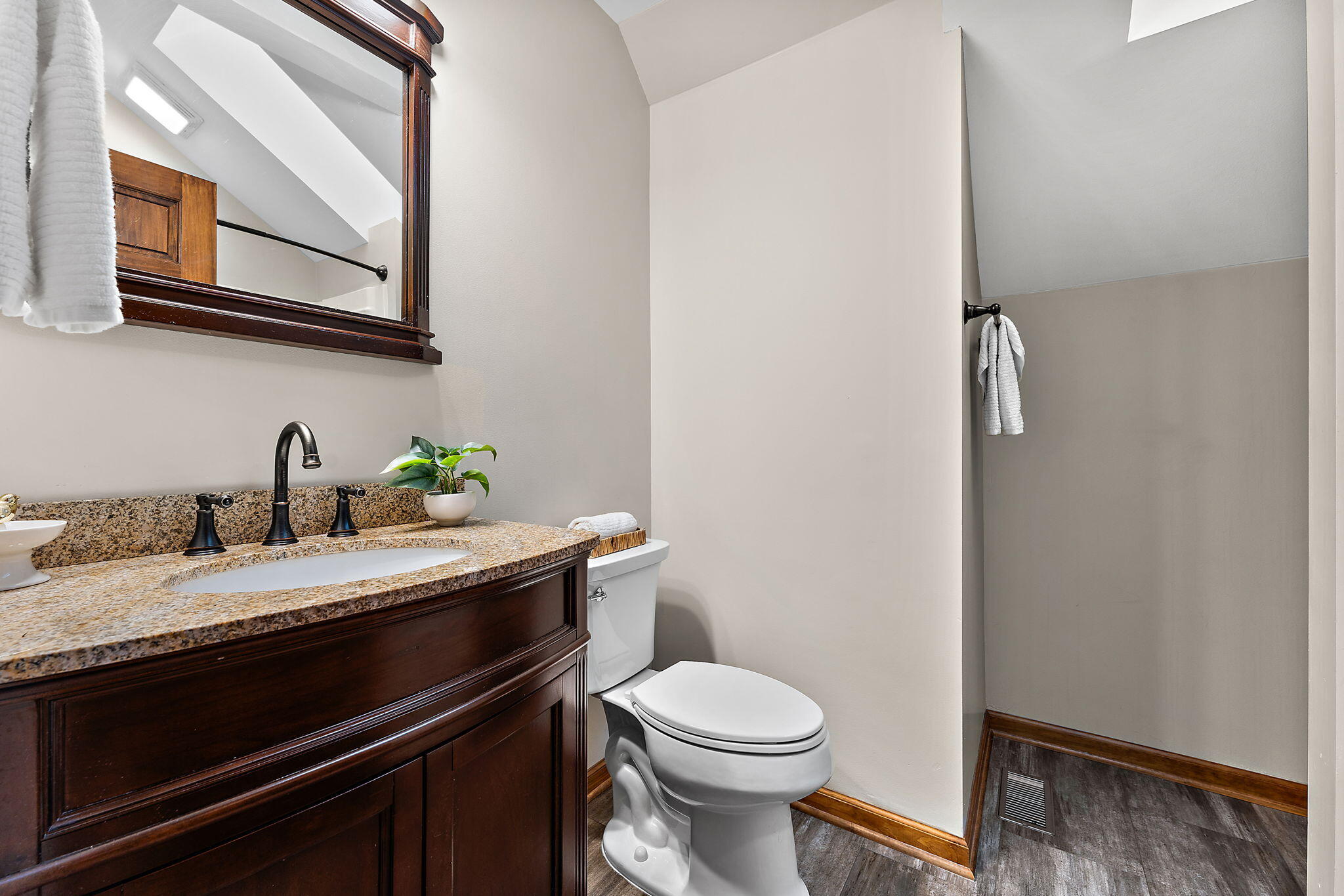 375 Reif Drive Hebron, IN 46341 - Photo 38 of 58 a bathroom with a granite countertop sink toilet and mirror