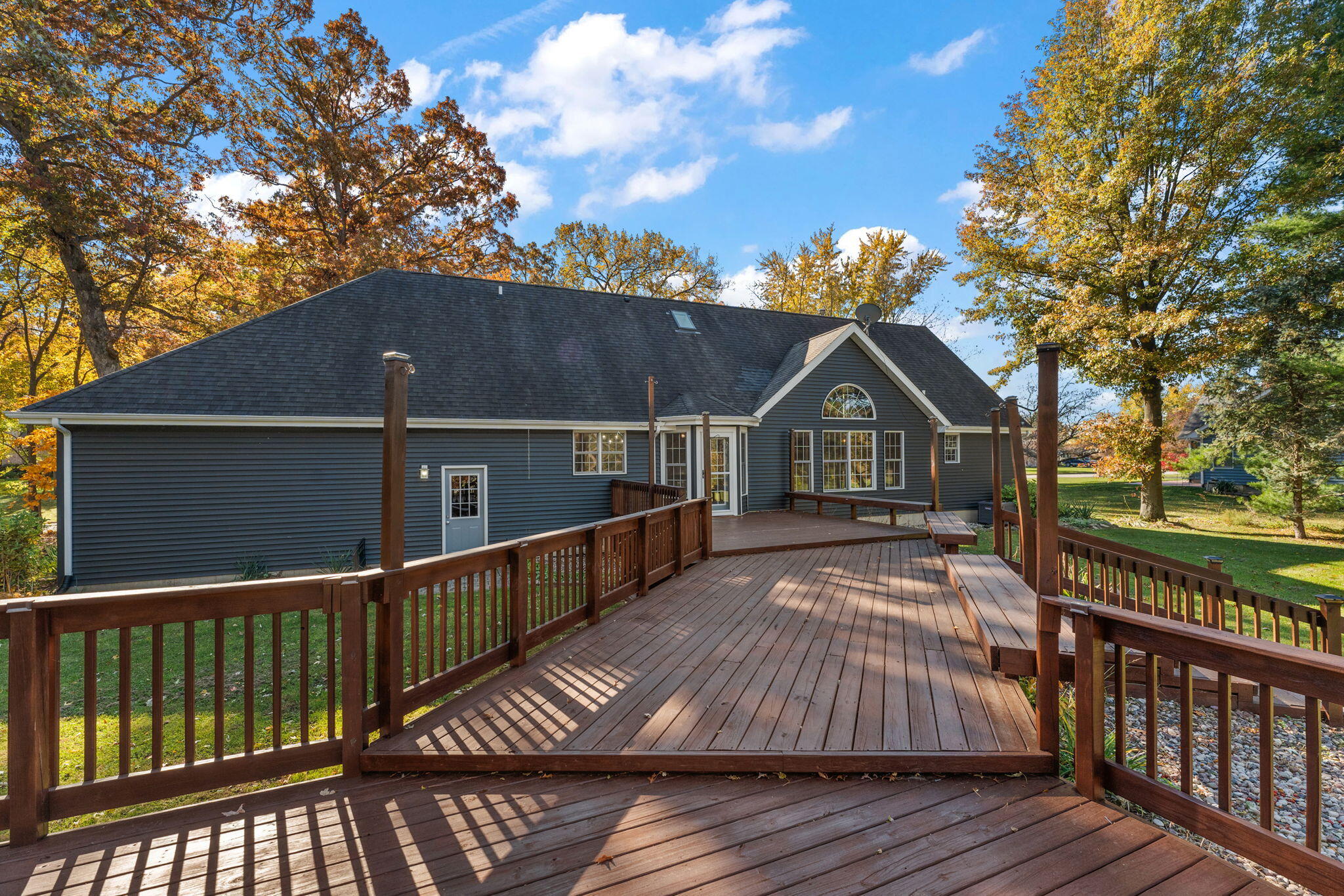 375 Reif Drive Hebron, IN 46341 - Photo 45 of 58 a view of house with wooden floor and trees in the background