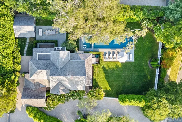 an aerial view of a house with a garden