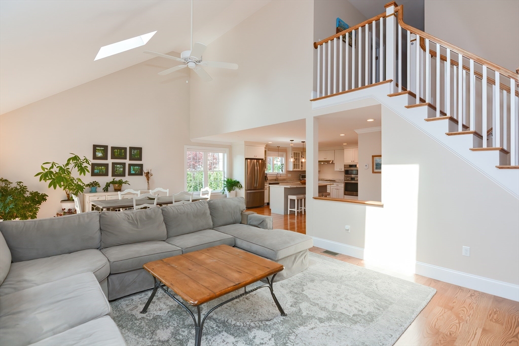 29 Webb Place, Unit A Mansfield, MA 02048 - Photo 15 of 42 a living room with furniture and a rug
