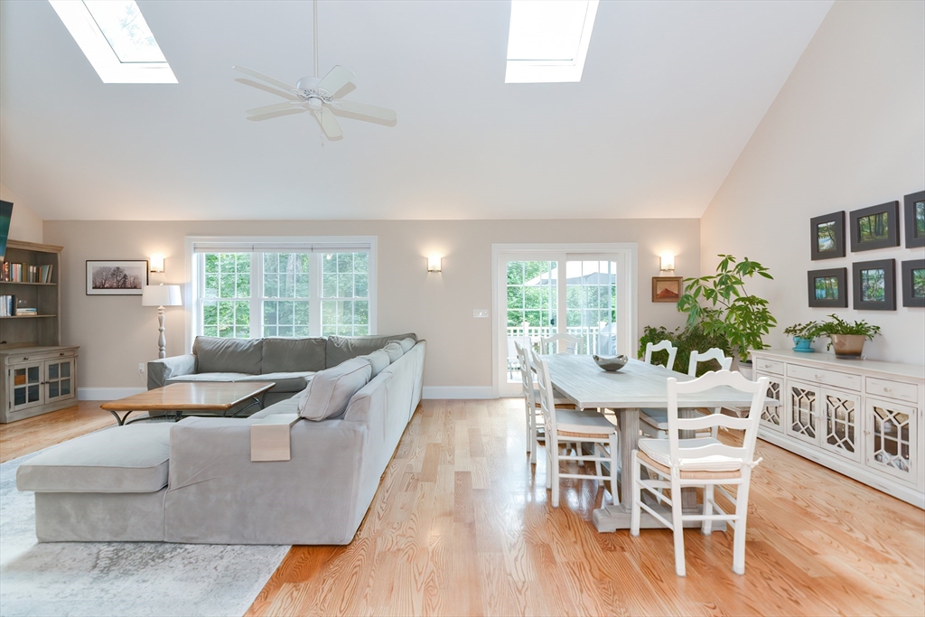 29 Webb Place, Unit A Mansfield, MA 02048 - Photo 16 of 42 a living room with furniture wooden floor and a large window