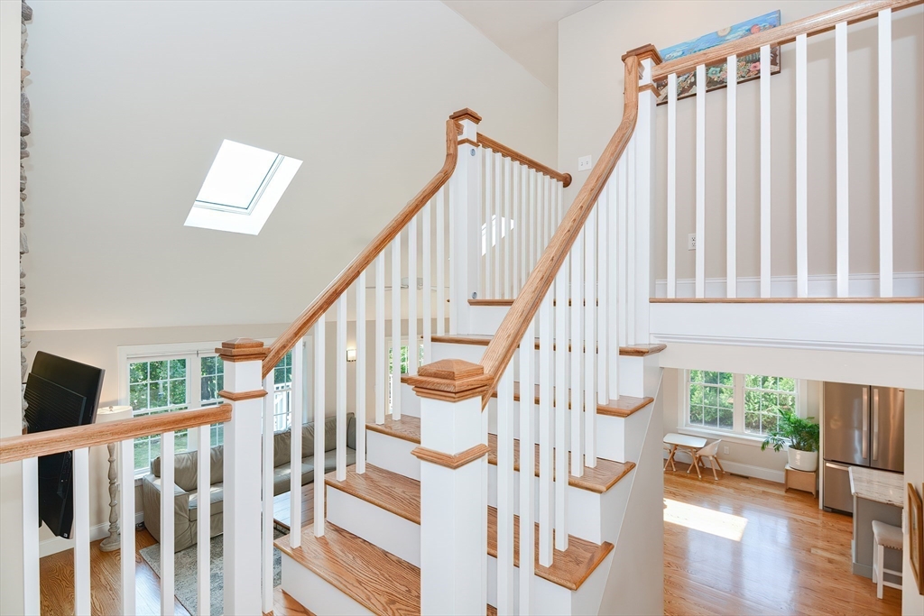 29 Webb Place, Unit A Mansfield, MA 02048 - Photo 22 of 42 a view of entryway with wooden floor and stairs