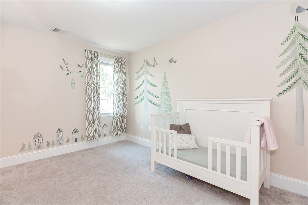 29 Webb Place, Unit A Mansfield, MA 02048 - Photo 30 of 42 a view of entryway with wooden floor