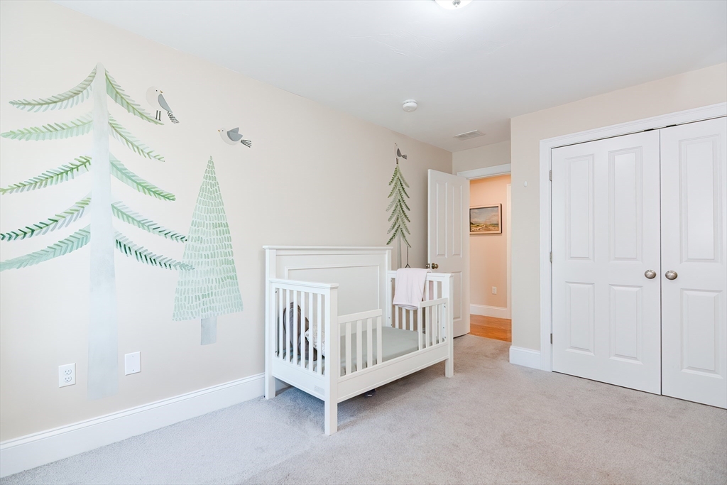 29 Webb Place, Unit A Mansfield, MA 02048 - Photo 31 of 42 a view of a room with stairs and a window