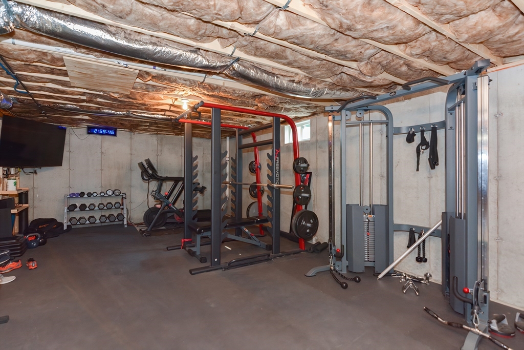 29 Webb Place, Unit A Mansfield, MA 02048 - Photo 35 of 42 a view of a room with gym equipment