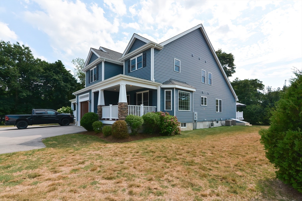 29 Webb Place, Unit A Mansfield, MA 02048 - Photo 40 of 42 a view of a yard in front of house