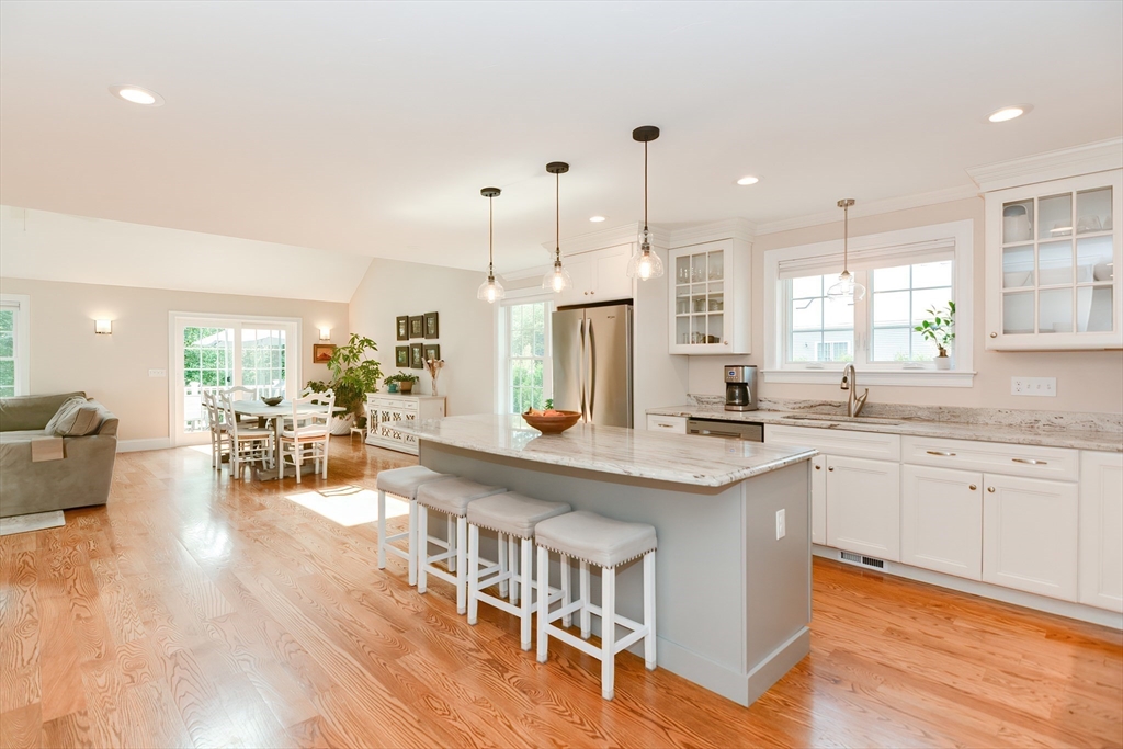 29 Webb Place, Unit A Mansfield, MA 02048 - Photo 4 of 42 a kitchen with lots of counter top space and dining table