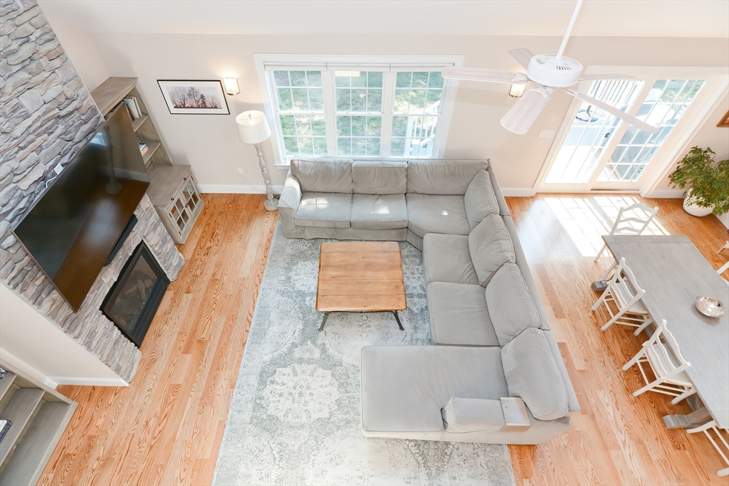 29 Webb Place, Unit A Mansfield, MA 02048 - Photo 8 of 42 a living room with furniture and a large window
