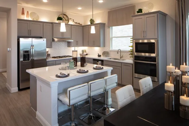 a bedroom with a bed and a cabinets