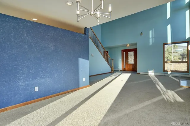 a view of a hall with stairs