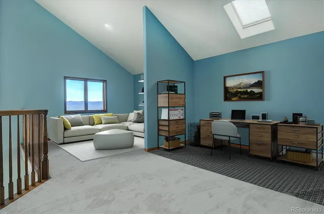 a living room with furniture and window