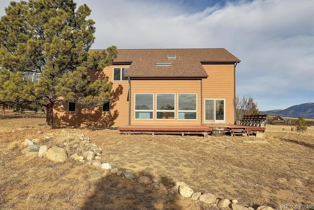 a view of a large building with large trees