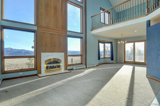 a view of an entryway with a floor to ceiling window