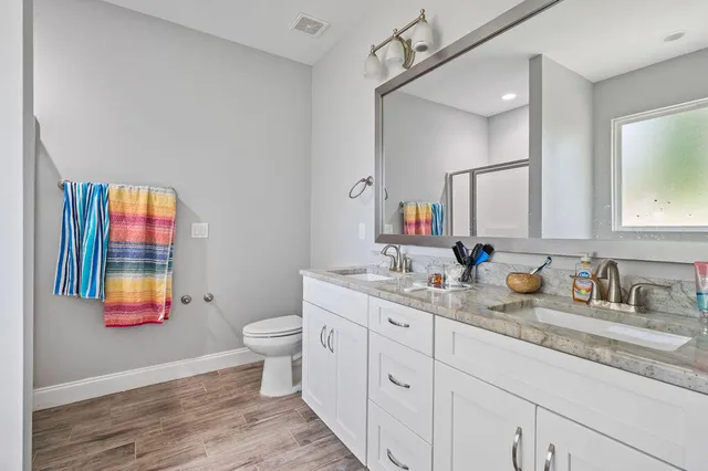 a view of a chandelier fan in a room