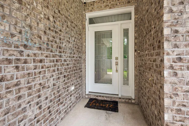a bathroom with a sink and a shower