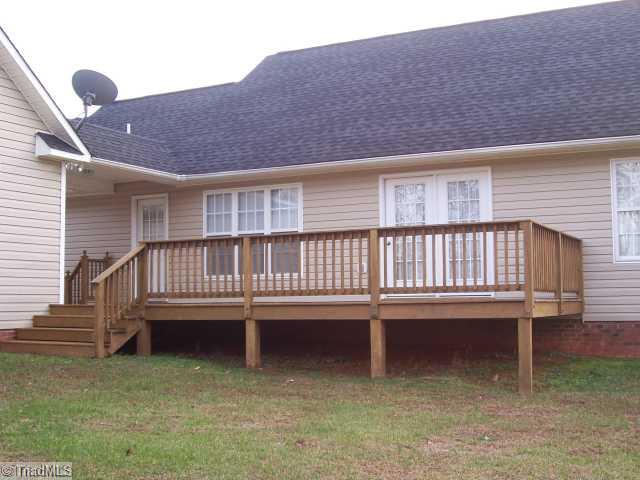 1110 Woodbury Road King, NC 27021 - Photo 7 of 11 Patio/Deck. Bring the patio furniture and the grill.. Enormous 12x30 back deck!!!