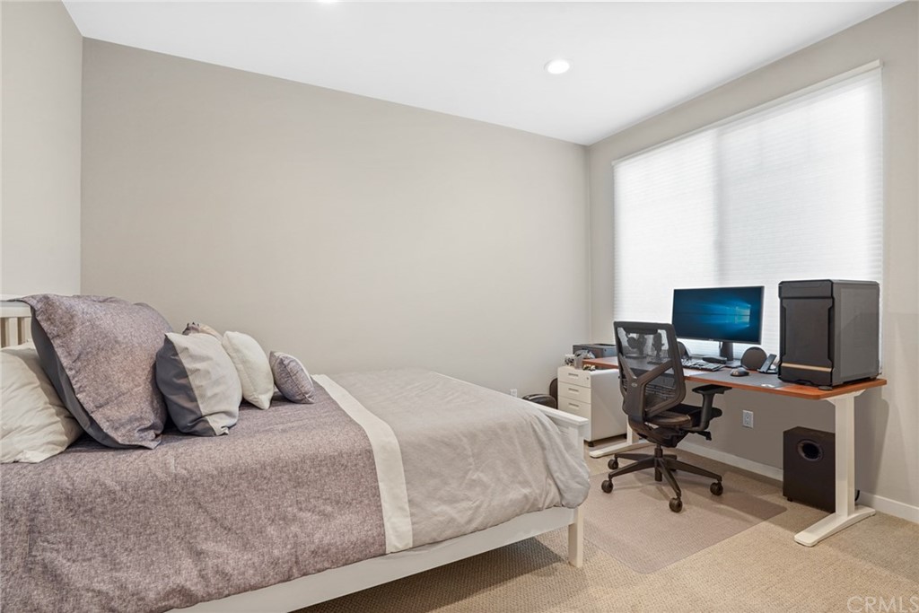 237 Magnet Irvine, CA 92618 - Photo 18 of 22 a bedroom with a bed and a desk
