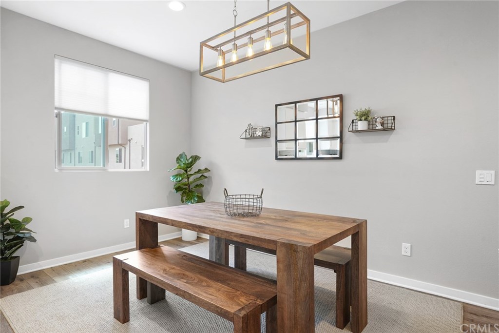 237 Magnet Irvine, CA 92618 - Photo 8 of 22 a dining room with a table and chairs