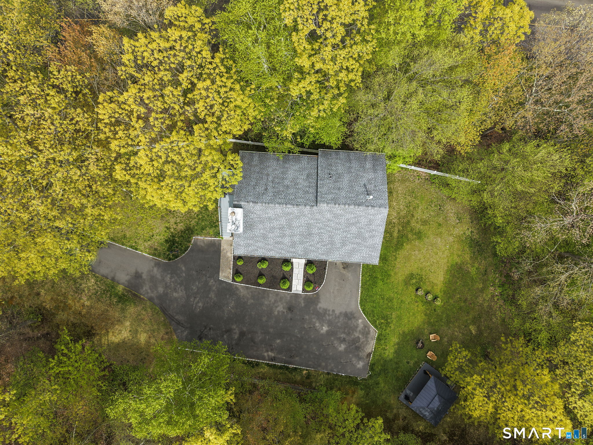 1118 Spindle Hill Road Wolcott, CT 06716 - Photo 9 of 38 a aerial view of a house with a yard