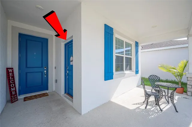 a workspace with furniture and a window