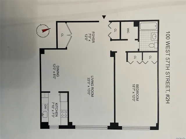 a view of a livingroom with wooden floor and a window