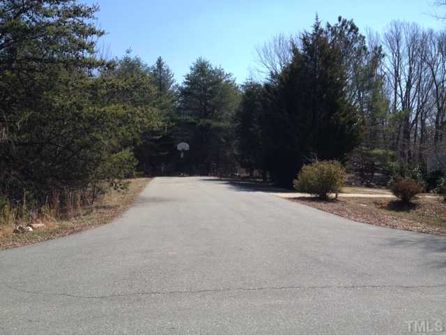 Graham Drive Roxboro, NC 27573 - Photo 3 of 4 a street view with large trees