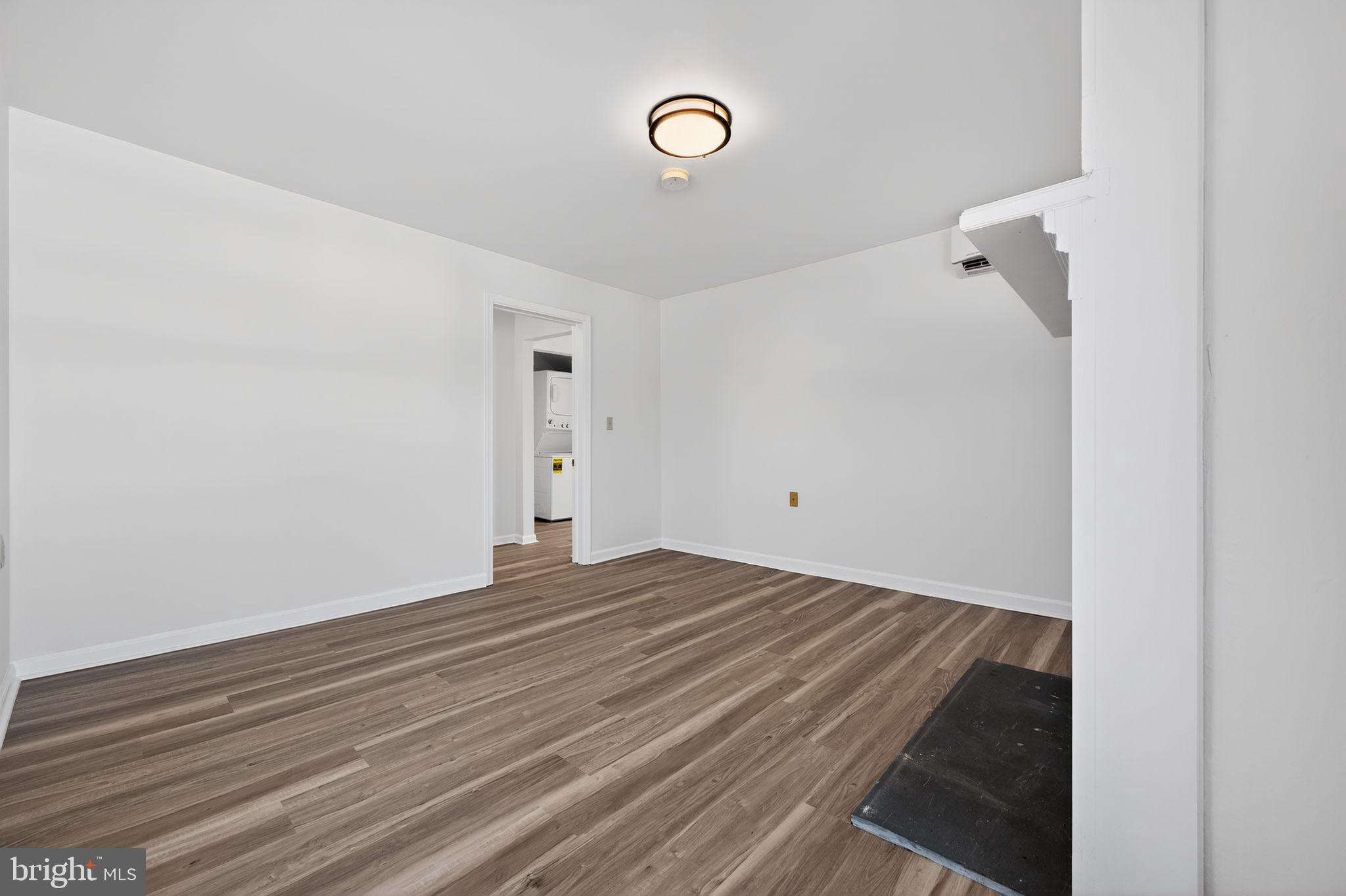 793 Penns Park Road, Unit C Newtown, PA 18940 - Photo 14 of 18 a view of a room with wooden floor