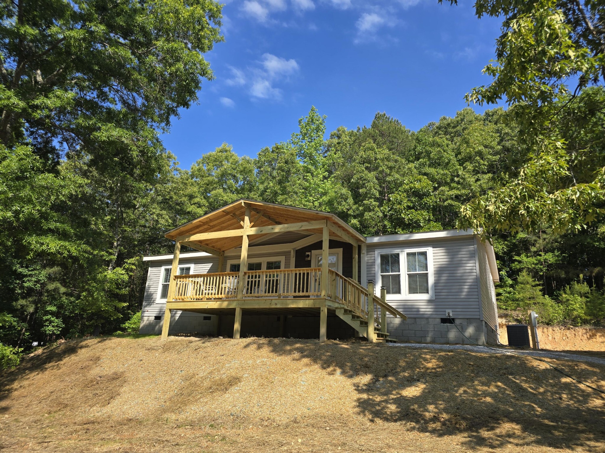1629 Wasson Road Ten Mile, TN 37880 - Photo 26 of 27 a front view of a house with a yard