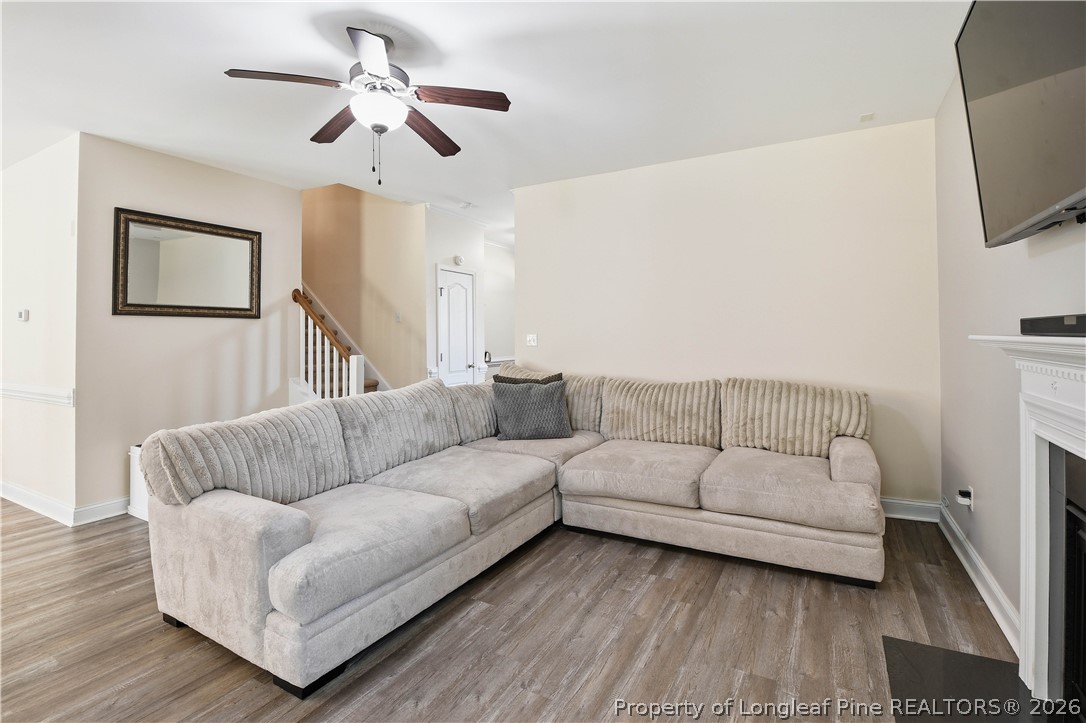 140 Birch Avenue Spring Lake, NC 28390 - Photo 17 of 49 a living room with furniture a flat screen tv and a couch