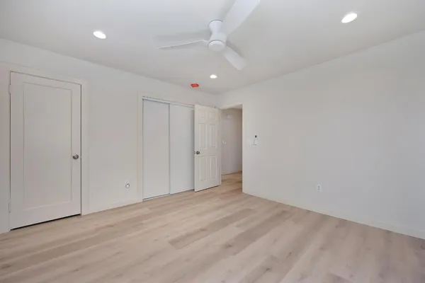 a backyard of a house with lots of green space