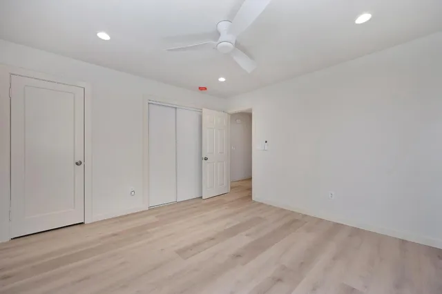 a backyard of a house with lots of green space