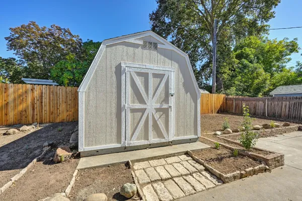 a view of a balcony with wooden floor