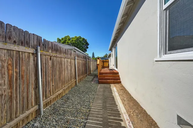 a balcony with view of stairs
