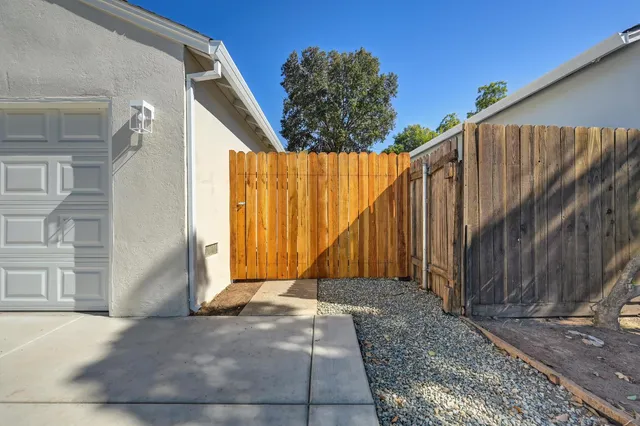a view of a back yard of the house