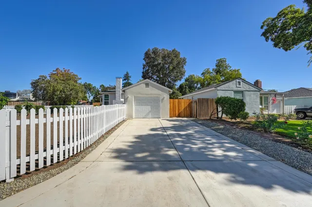 a view of a wrought iron fences in front of house