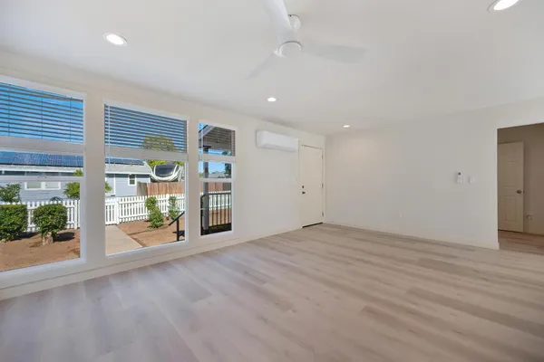 a kitchen with stainless steel appliances a sink and a granite counter tops