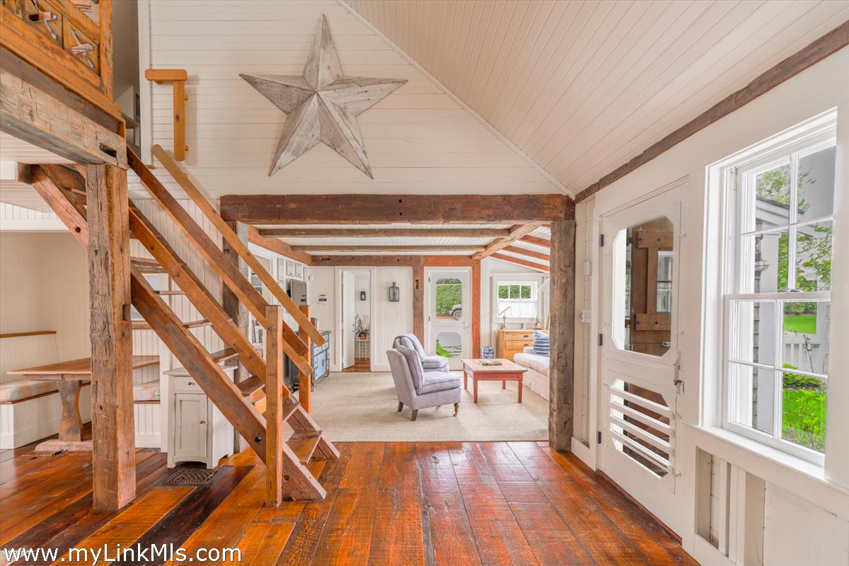 14 & 16 Coffin Street Nantucket, MA 02554 - Photo 28 of 50 a view of an entryway with wooden floor and windows